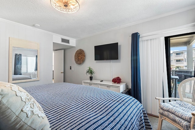 carpeted bedroom featuring crown molding, a textured ceiling, visible vents, and multiple windows