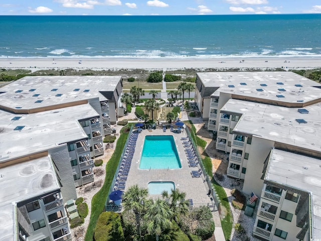 bird's eye view featuring a beach view and a water view