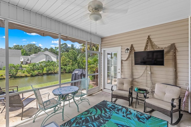 232 Je Edward Dr Unit 21, Myrtle Beach, SC 29588 - sunroom featuring an outdoor hangout area, a ceiling fan, and a water view