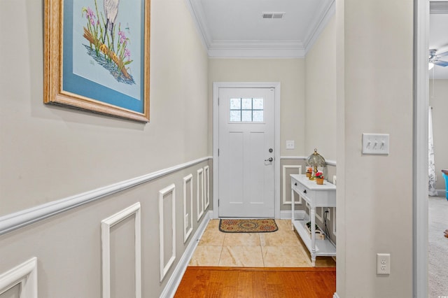 232 Je Edward Dr Unit 21, Myrtle Beach, SC 29588 - doorway featuring crown molding, a ceiling fan, and visible vents