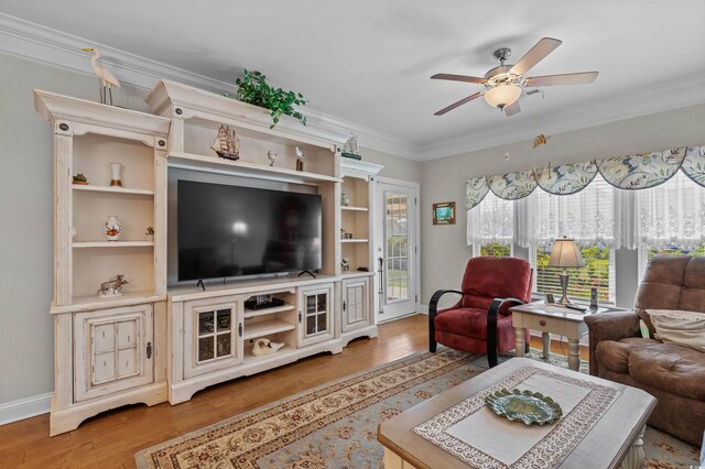 232 Je Edward Dr Unit 21, Myrtle Beach, SC 29588 - living room featuring baseboards, ornamental molding, a ceiling fan, and light wood-type flooring