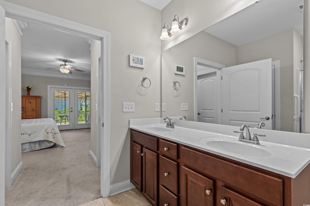232 Je Edward Dr Unit 21, Myrtle Beach, SC 29588 - bathroom featuring a sink, ceiling fan, french doors, and ensuite bath