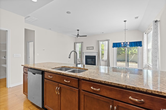 962 Witherbee Way, Little River, SC 29566 - kitchen with stainless steel dishwasher, visible vents, a sink, light wood-style flooring, and decorative light fixtures