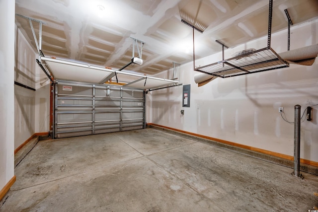962 Witherbee Way, Little River, SC 29566 - garage with baseboards, a garage door opener, and electric panel