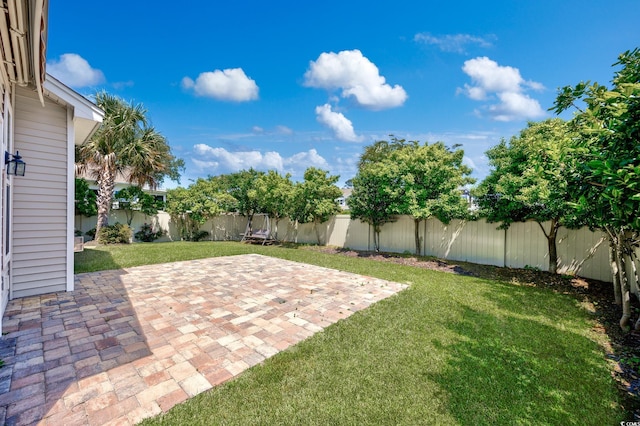 962 Witherbee Way, Little River, SC 29566 - view of yard with a fenced backyard and a patio
