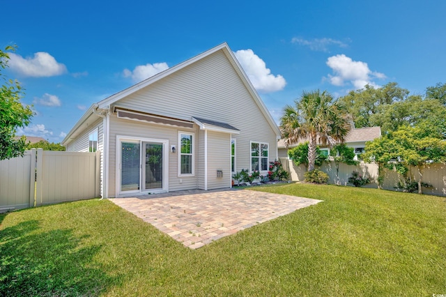 962 Witherbee Way, Little River, SC 29566 - rear view of property featuring a lawn, a patio, and a fenced backyard
