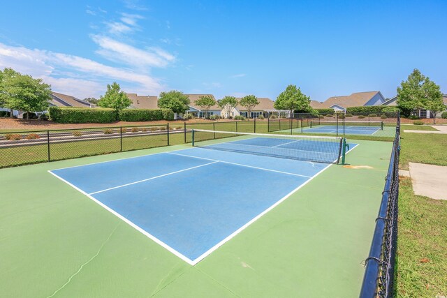 962 Witherbee Way, Little River, SC 29566 - view of tennis court with fence and a residential view