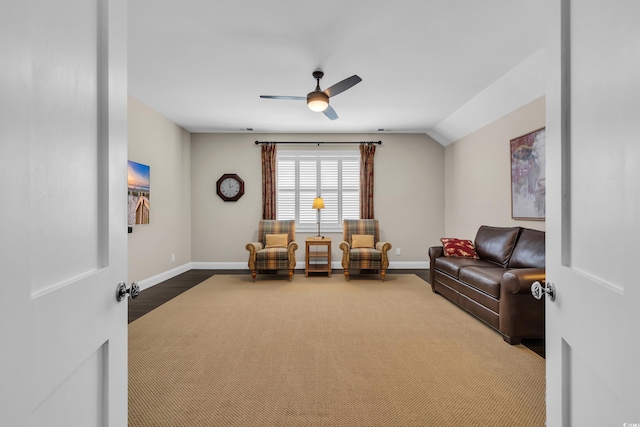 1136 Doubloon Dr, North Myrtle Beach, SC 29582 - living area featuring baseboards, ceiling fan, lofted ceiling, and carpet floors