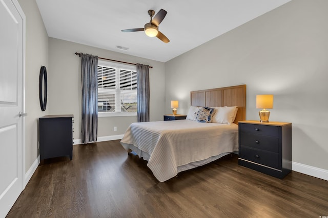 1136 Doubloon Dr, North Myrtle Beach, SC 29582 - bedroom with baseboards, dark wood-type flooring, visible vents, and ceiling fan