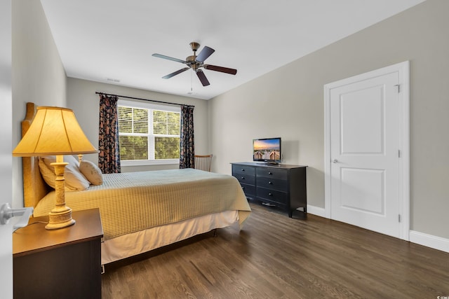 1136 Doubloon Dr, North Myrtle Beach, SC 29582 - bedroom featuring baseboards, a ceiling fan, wood finished floors, and visible vents