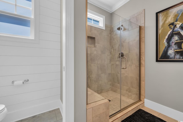 1136 Doubloon Dr, North Myrtle Beach, SC 29582 - full bathroom with tile patterned floors, ornamental molding, a stall shower, and toilet