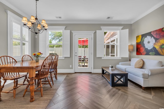 1136 Doubloon Dr, North Myrtle Beach, SC 29582 - dining area with baseboards, visible vents, ornamental molding, and an inviting chandelier