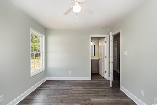 469 Overcrest St, Myrtle Beach, SC 29579 - unfurnished bedroom with dark wood finished floors, ensuite bathroom, and ceiling fan