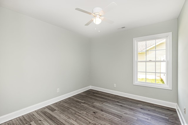 469 Overcrest St, Myrtle Beach, SC 29579 - unfurnished room with dark wood finished floors, plenty of natural light, and a ceiling fan