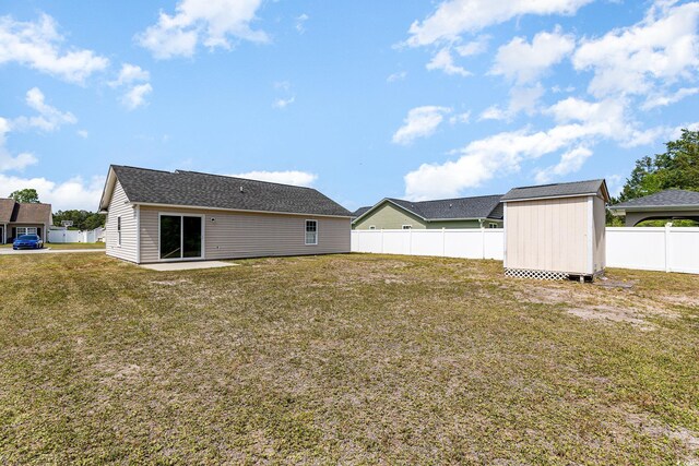 469 Overcrest St, Myrtle Beach, SC 29579 - rear view of house featuring a storage unit and a fenced backyard