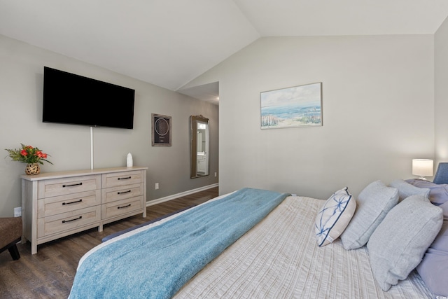 bedroom with baseboards, lofted ceiling, and dark wood-type flooring