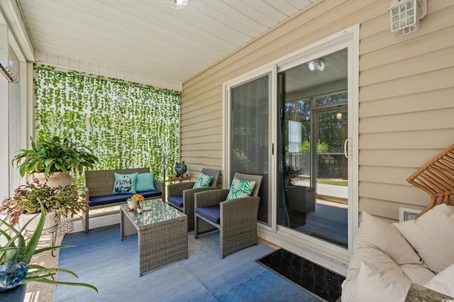 exterior space featuring an outdoor hangout area