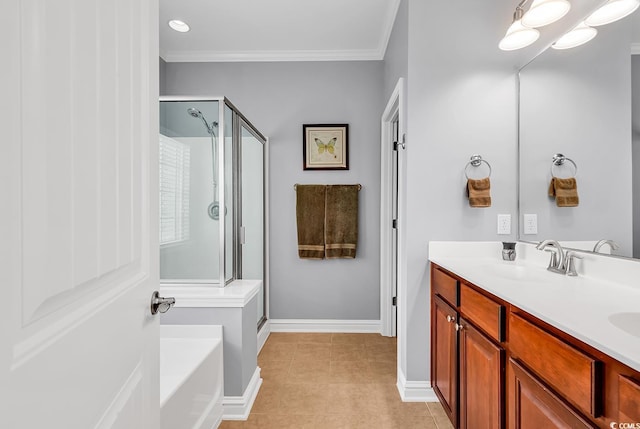 full bathroom featuring a garden tub, double vanity, ornamental molding, a shower stall, and a sink