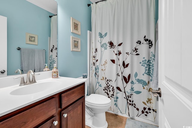 bathroom featuring vanity, tile patterned flooring, a shower with curtain, and toilet
