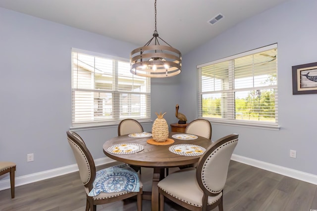 428 Calhoun Falls Dr, Myrtle Beach, SC 29579 - dining space featuring vaulted ceiling, a chandelier, dark wood-style flooring, and baseboards