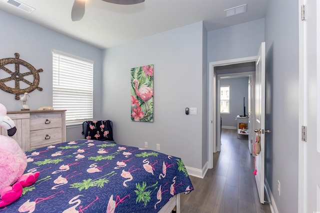428 Calhoun Falls Dr, Myrtle Beach, SC 29579 - bedroom featuring wood finished floors, a ceiling fan, and baseboards