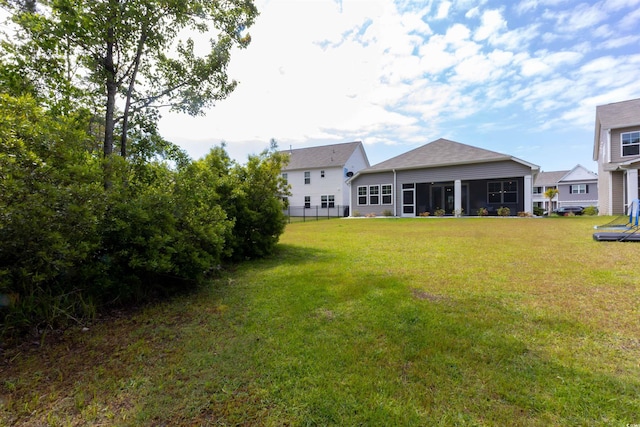 428 Calhoun Falls Dr, Myrtle Beach, SC 29579 - view of yard featuring a sunroom