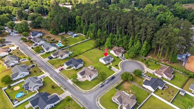 view of property location featuring nearby suburban area