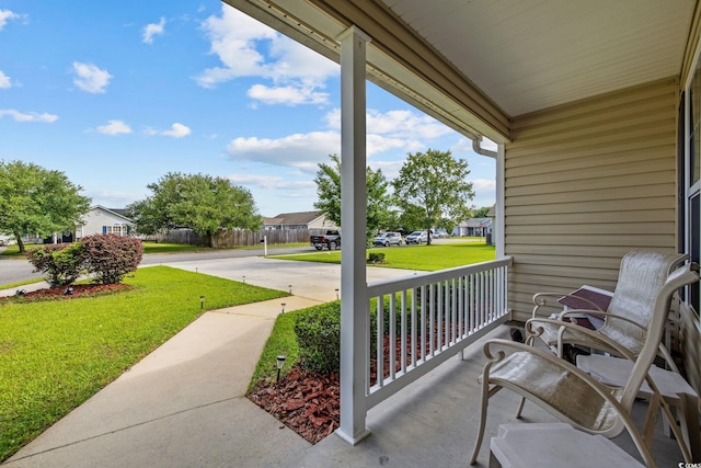 view of patio with a porch and a residential view
