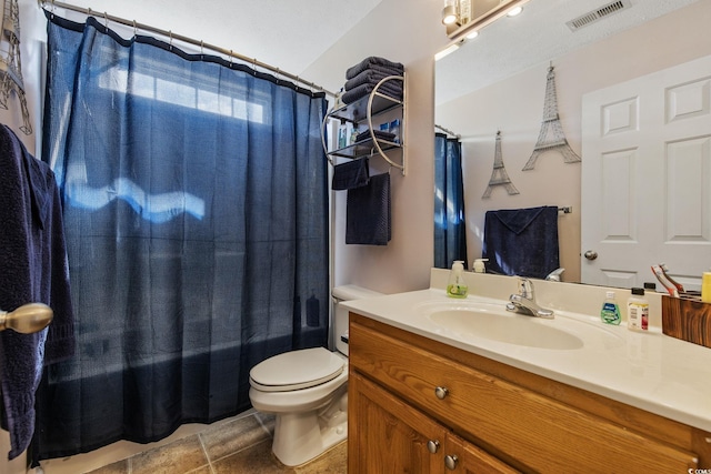 full bathroom with toilet, vanity, a shower with curtain, and tile patterned flooring
