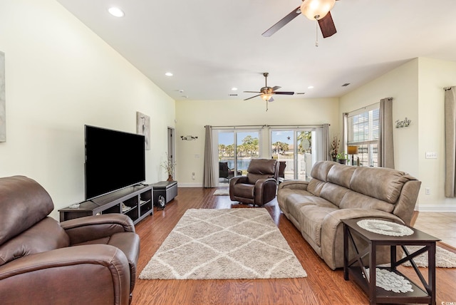 2940 Tigers Eye Rd, Little River, SC 29566 - living room with ceiling fan, recessed lighting, baseboards, and wood finished floors