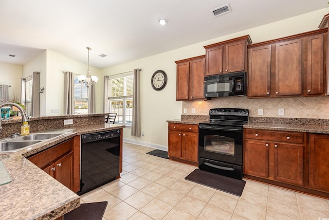 2940 Tigers Eye Rd, Little River, SC 29566 - kitchen featuring black appliances, a sink, a chandelier, decorative backsplash, and lofted ceiling