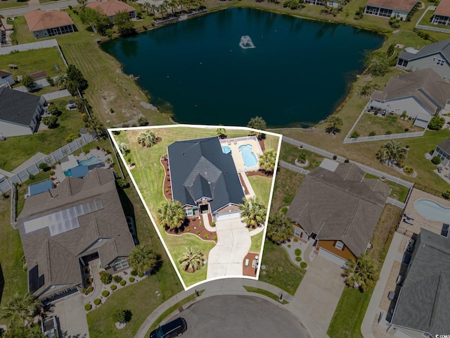 2940 Tigers Eye Rd, Little River, SC 29566 - aerial overview of property's location with a large body of water, property parcel outlined, and nearby suburban area