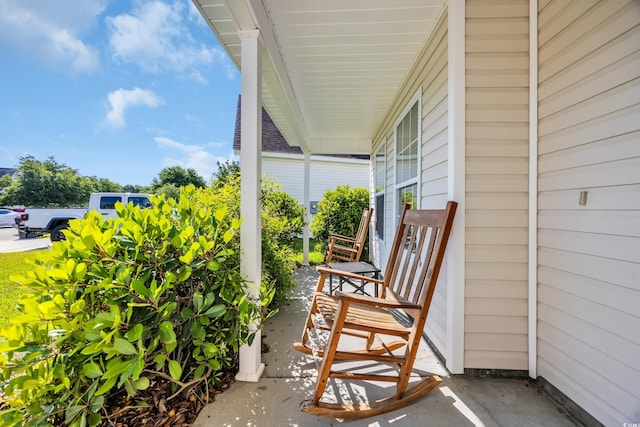 381 Winslow Ave, Myrtle Beach, SC 29588 - balcony featuring a porch