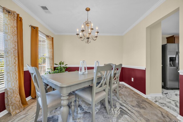 381 Winslow Ave, Myrtle Beach, SC 29588 - dining space with crown molding, a chandelier, marble finish floor, baseboards, and visible vents