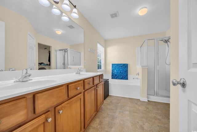 381 Winslow Ave, Myrtle Beach, SC 29588 - bathroom with visible vents, a sink, a bath, and a stall shower