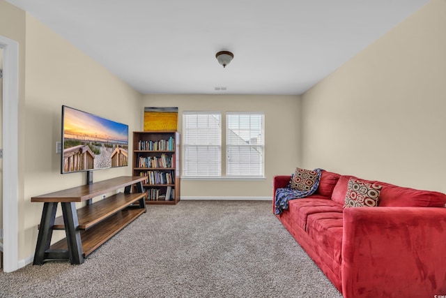 381 Winslow Ave, Myrtle Beach, SC 29588 - living area with baseboards, visible vents, and carpet