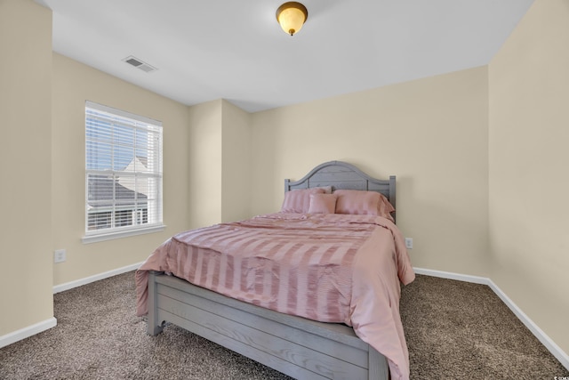 381 Winslow Ave, Myrtle Beach, SC 29588 - bedroom with baseboards, visible vents, and carpet