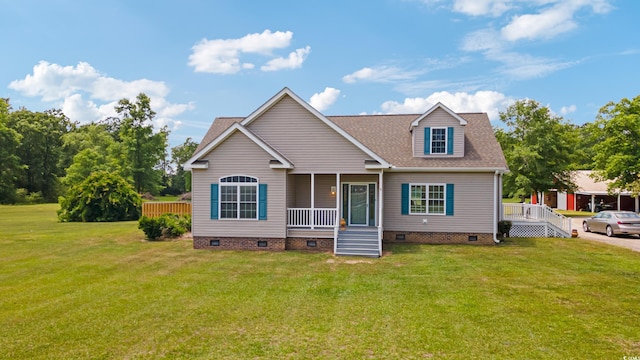 view of front of house featuring a porch, crawl space, and a front lawn