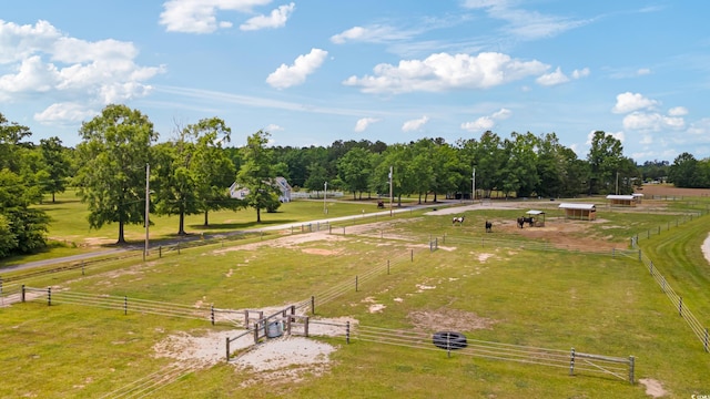 birds eye view of property featuring a rural view