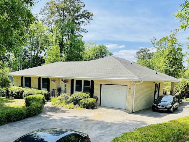801 Talbot Cir, Myrtle Beach, SC 29577 - single story home with brick siding, an attached garage, a shingled roof, and driveway