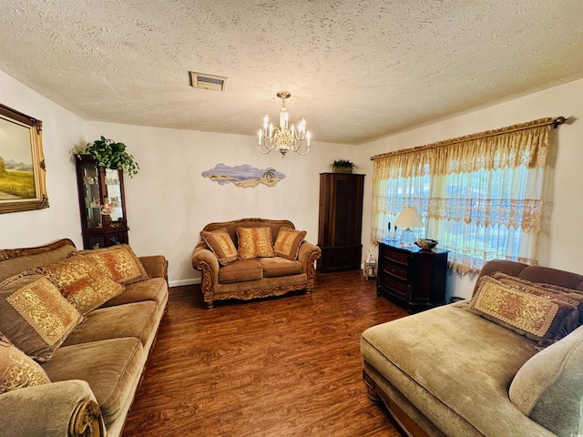 801 Talbot Cir, Myrtle Beach, SC 29577 - living room featuring a chandelier, wood finished floors, a textured ceiling, and baseboards