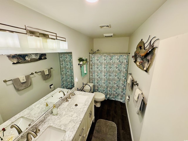 801 Talbot Cir, Myrtle Beach, SC 29577 - full bath featuring toilet, wood finished floors, double vanity, and a shower with curtain