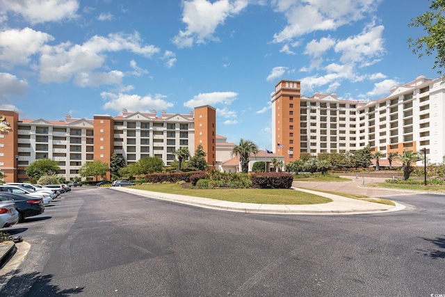 8121 Amalfi Pl Unit 4-801, Myrtle Beach, SC 29572 - view of apartment building / complex featuring uncovered parking