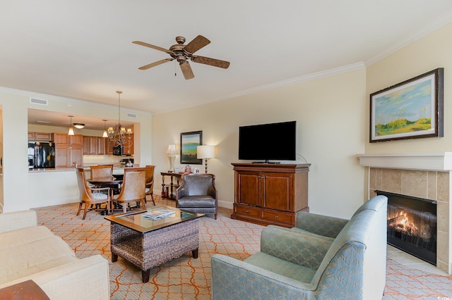 8121 Amalfi Pl Unit 4-801, Myrtle Beach, SC 29572 - living area featuring crown molding, a ceiling fan, a fireplace, and a chandelier