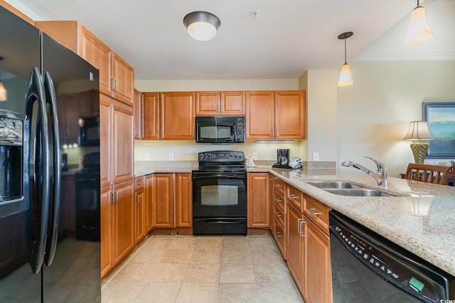 8121 Amalfi Pl Unit 4-801, Myrtle Beach, SC 29572 - kitchen with black appliances, light stone counters, hanging light fixtures, and brown cabinets