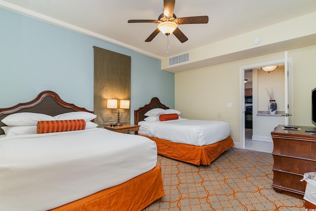 8121 Amalfi Pl Unit 4-801, Myrtle Beach, SC 29572 - bedroom with light tile patterned floors and a ceiling fan