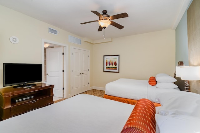 8121 Amalfi Pl Unit 4-801, Myrtle Beach, SC 29572 - bedroom featuring baseboards and a ceiling fan