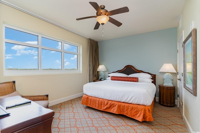 8121 Amalfi Pl Unit 4-801, Myrtle Beach, SC 29572 - bedroom with light carpet and ceiling fan