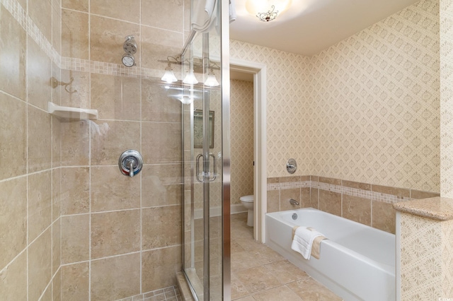 8121 Amalfi Pl Unit 4-801, Myrtle Beach, SC 29572 - bathroom featuring a stall shower, a garden tub, tile patterned floors, and wallpapered walls