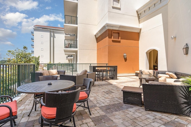 8121 Amalfi Pl Unit 4-801, Myrtle Beach, SC 29572 - view of patio with outdoor dining area and outdoor lounge area